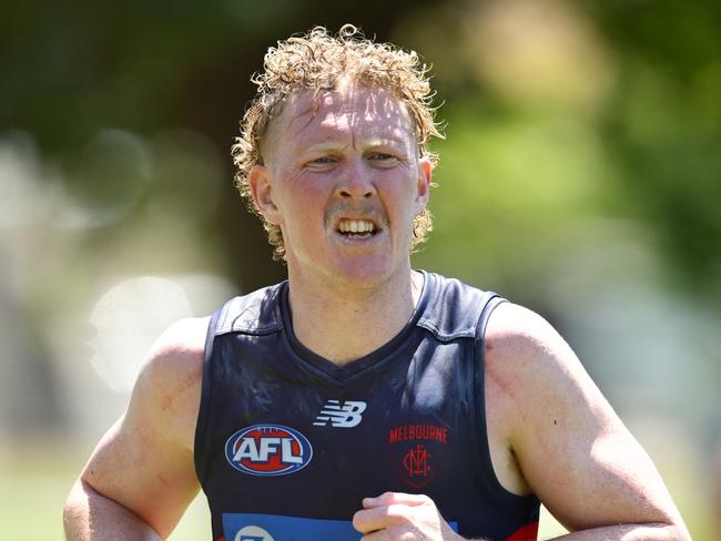 MELBOURNE, AUSTRALIA - NOVEMBER 22: Clayton Oliver of the Demons runs laps during a Melbourne Demons AFL training session at Gosch's Paddock on November 22, 2024 in Melbourne, Australia. (Photo by Quinn Rooney/Getty Images)