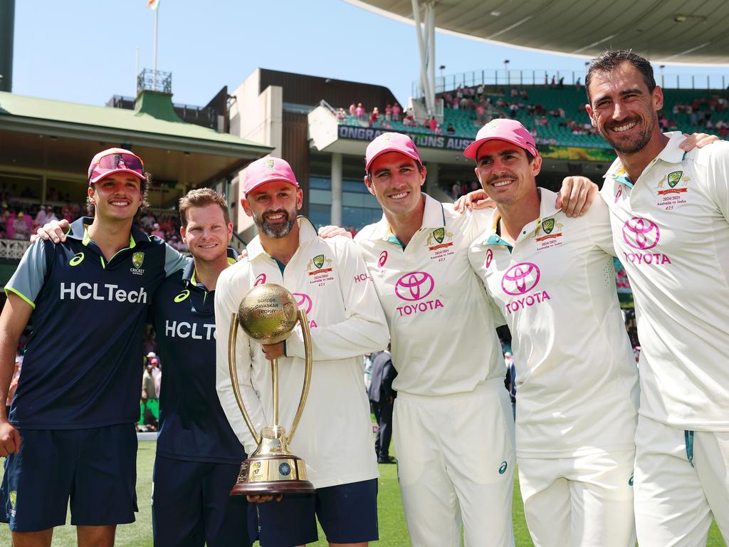 Sam Konstas, Steve Smith, Nathan Lyon, Pat Cummins, Sean Abbott and Mitchell Starc pose for a photo after reclaiming the Border-Gavaskar Trophy. Picture: Getty