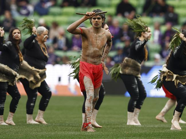 MELBOURNE, AUSTRALIA - JUNE 11: Indigenous dancers perform during a welcome to country before the round 15 NRL match between Melbourne Storm and Cronulla Sharks at AAMI Park on June 11, 2023 in Melbourne, Australia. (Photo by Daniel Pockett/Getty Images)