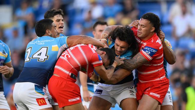 An all-in brawl broke out, with Titans star Erin Clark appearing the strike at Dragons Fullback Tyrell Sloan. Picture: NRL Imagery.