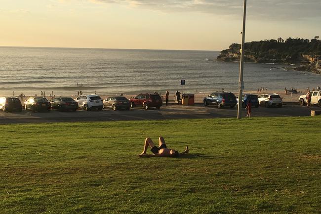 One man lies in Bondi after celebrating new years. Picture: Henry Lynch