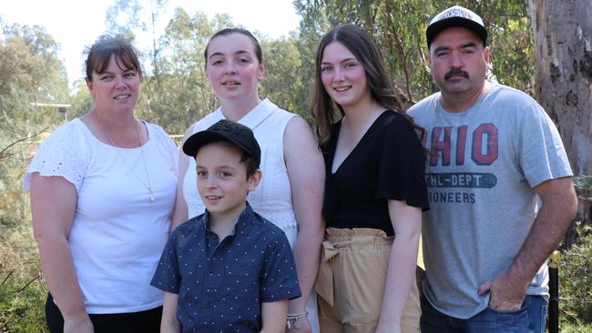 Leading Senior Constable Dennis Cox (right) with (L-R) wife Selina, son Jacob, 11, and daughters Shauna, 20 and Hannah, 17.