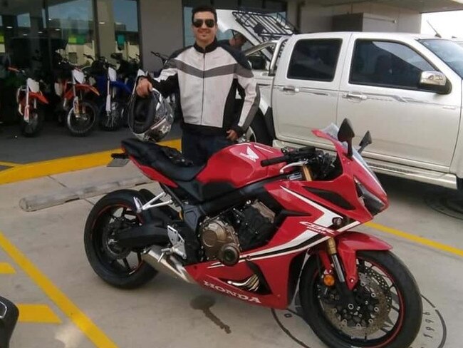 Mr Barrett was last seen riding his red Honda 650 motorbike. Picture: Supplied