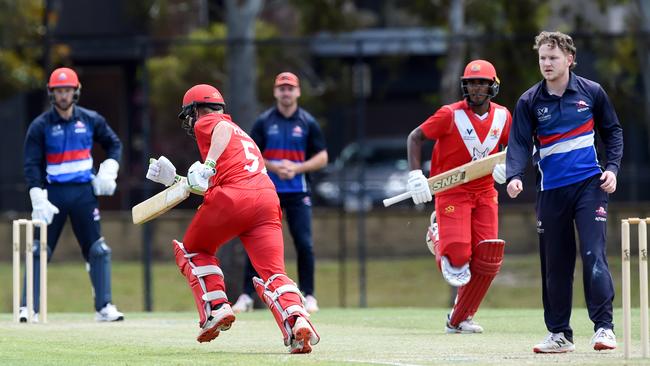 Jay Vine watches on as Devin Pollock and Ashley Chandrasinghe run. Picture: Steve Tanner