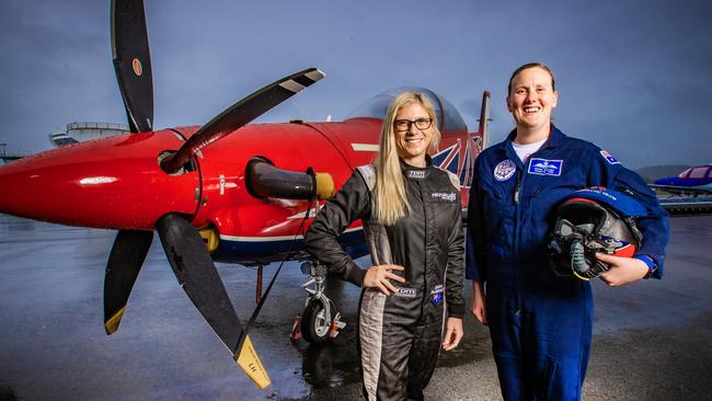 Pacific Airshow Media Day. Matt Hall Racing Pilot Emma McDonald with Flight Lieutenant Brodie Sweeney from the Air Force Roulettes. Picture: Nigel Hallett