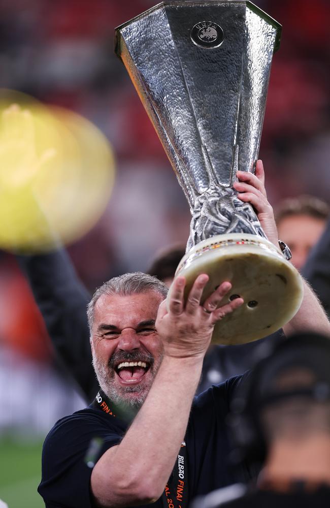 Ange Postecoglou celebrates with the UEFA Europa League trophy. Picture: Getty Images