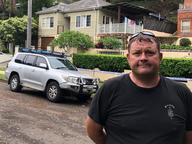 Ian Hughes, and his young family of three, are not allowed back into their home in Garden St, North Narrabeen, due to dangers of landslips behind the house. Picture: Jim O'Rourke