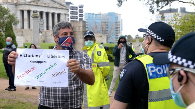 Anti-lockdown protester near the Shrine of Remembrance. Picture: Andrew Henshaw