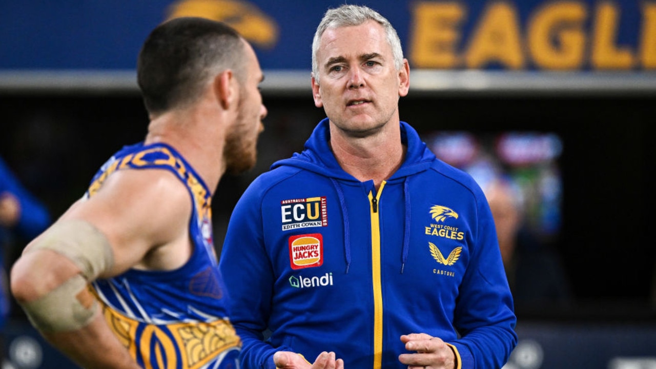 PERTH, AUSTRALIA - MAY 28: Adam Simpson, Senior Coach of the Eagles talks with Luke Shuey after the loss during the 2022 AFL Round 11 match between the West Coast Eagles and the Western Bulldogs at Optus Stadium on May 28, 2022 in Perth, Australia. (Photo by Daniel Carson/AFL Photos via Getty Images)
