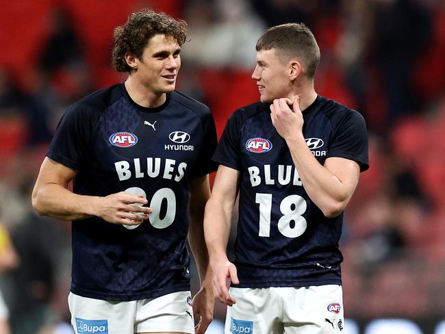 SYDNEY, AUSTRALIA - JULY 06: Charlie Curnow and Sam Walsh of the Blues warm up prior to the round 17 AFL match between Greater Western Sydney Giants and Carlton Blues at ENGIE Stadium, on July 06, 2024, in Sydney, Australia. (Photo by Brendon Thorne/AFL Photos/via Getty Images)