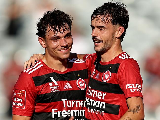 GOSFORD, AUSTRALIA - FEBRUARY 22: Dean Pelekanos of the Wanderers celebrates scoring a goal with team mates during the round 20 A-League Men match between Central Coast Mariners and Western Sydney Wanderers at Industree Group Stadium, on February 22, 2025, in Gosford, Australia. (Photo by Brendon Thorne/Getty Images)