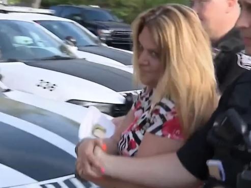 Christina Solometo is arrested after she allegedly defecated on a car during a road rage incident on April 29, 2025. Picture: NBC 10