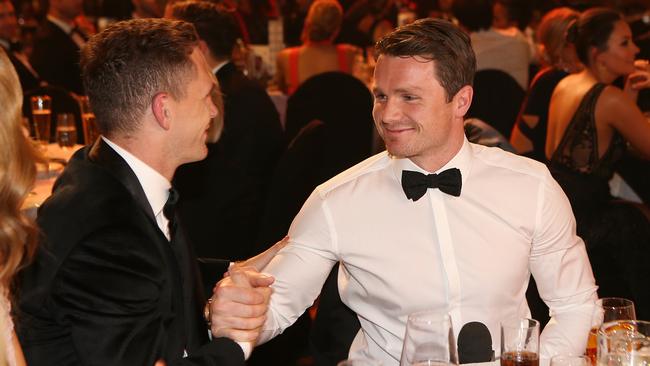 Joel Selwood congratulates Patrick Dangerfield on his Brownlow win. Picture: Wayne Ludbey