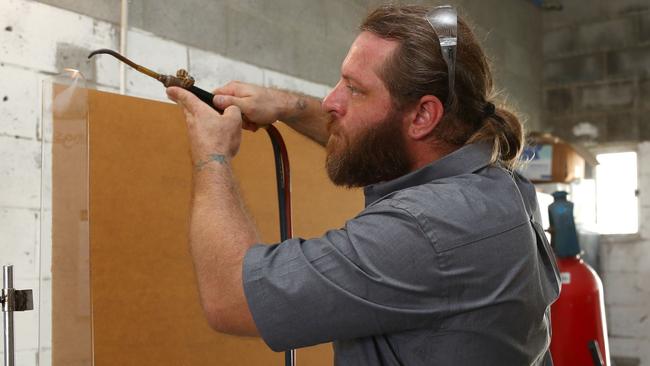 Kiel Taylor hard at work at the Allstar Plastics premises in Southport. Picture: Tertius Pickard