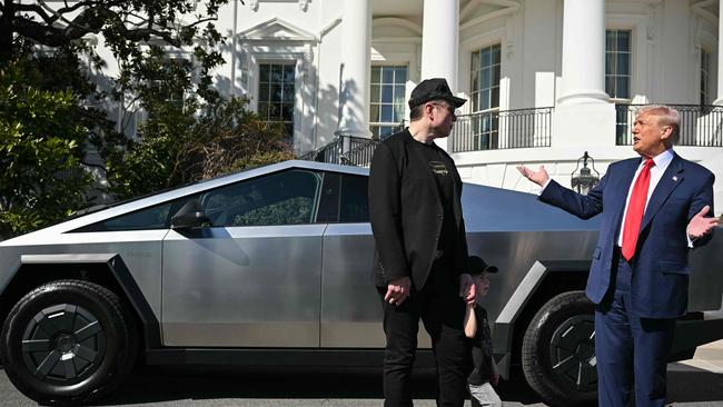 US President Donald Trump and Tesla CEO Elon Musk speak to the press as they stand next to a Tesla Cybertruck on the South Portico of the White House on March 11, 2025. Picture: Mandel Ngan/AFP