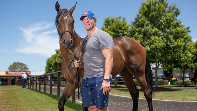 Former English rugby Test player Mike Tindall, a Magic Millions ambassador and hubby to Royal Zara Phillips, with a bay filly he has a share in which is the first lot in the Magic Millions yearling sale starting at 10am on Wednesday, Jan 10, 2018. Mr Tindall has a stake in a partnership involved in speculating on horses and they have six yearlings in the sale. Picture: Luke Marsden.