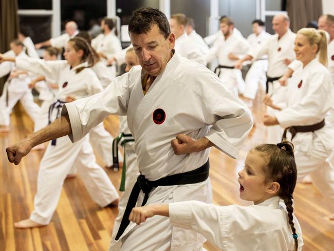 Jose (Joe) Roses instructs Violet Blair, 5, during a karate class in Tuggeranong in the ACT. Jose has been teaching karate for over 25 years and this year he will receive a Queens Birthday Honour. Picture by Sean Davey.