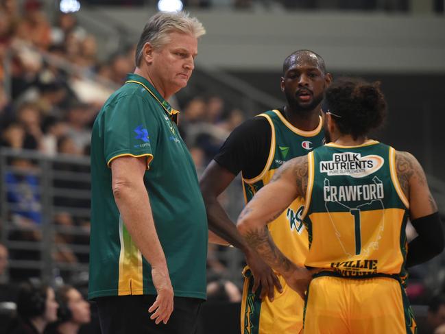 Scott Roth, head coach of the Tasmania JackJumpers, speaks to Milton Doyle and Jordon Crawford during the NBL Blitz in Queensland. Picture: Matt Roberts/Getty Images for NBL