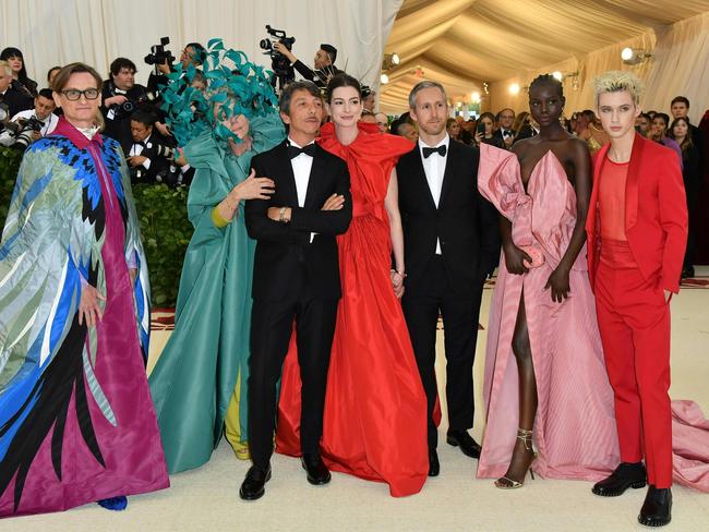 Troye Sivan, Adut Akech, Adam Shulman, Anne Hathaway, Pierpaolo Piccioli, Frances McDormand and Hamish Bowles on the red carpet. Picture: AFP