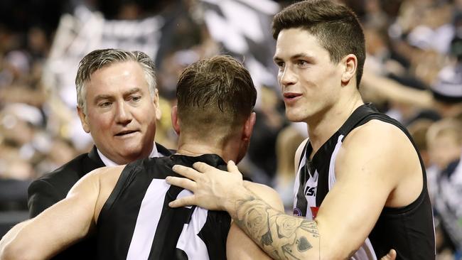 Then Pies president Eddie McGuire in 2017 with Taylor Adams and Jack Crisp. Picture: AFL Media