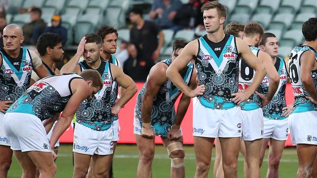 Power players react after their loss to Hawthorn. Picture: Getty Images