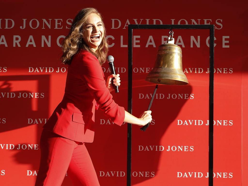 Ksenija Lukich rings the bell outside of the David Jones store in Elizabeth St, Sydney. Picture: Hanna Lassen/Getty Images