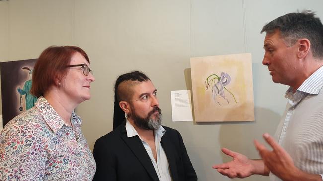 Macquarie state Labor MP Susan Templeman and opposition deputy leader Richard Marles discuss post-bushfire trade with Gallery One88 owner Victor Peralta (centre). “Everyone can do a service to rebuilding by visiting communities like Katoomba and Bilpin,” Mr Marles said. Picture: Isabell Petrinic