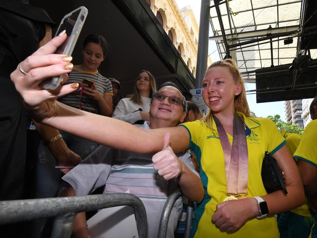 Commonwealth Games para swimmer Lakeisha Patterson poses for a selfie with a fan. Picture: Dan Peled/AAP