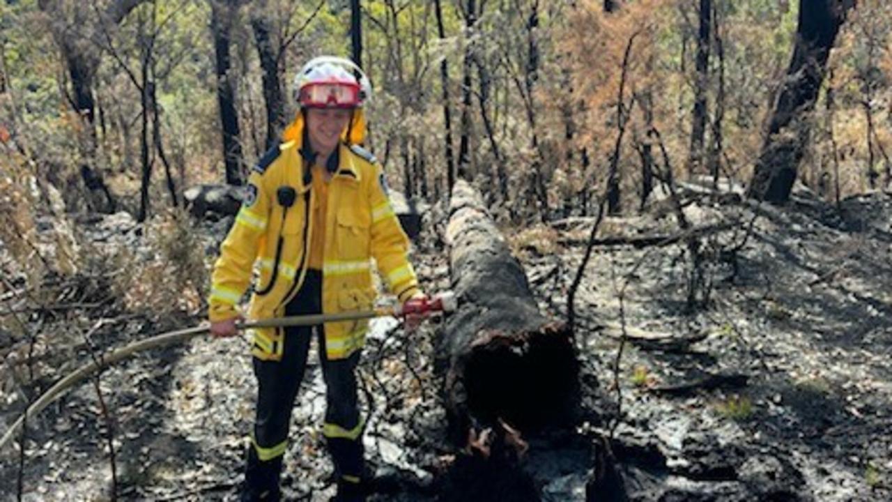 Flyn Morgan from the Grose Vale RFS Brigade extinguishing a relit hazard reduction burn. Picture: supplied