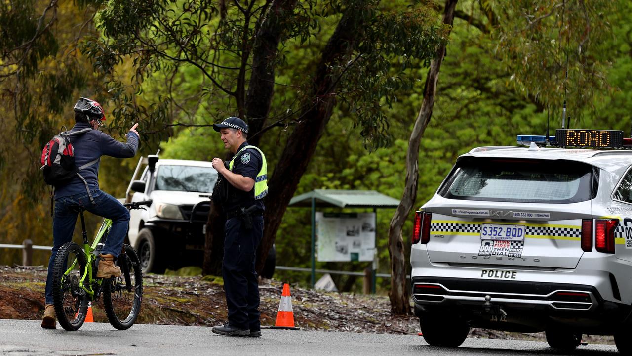 Police close the Strathalbyn road into Echunga from Hahndorf. Picture: Kelly Barnes