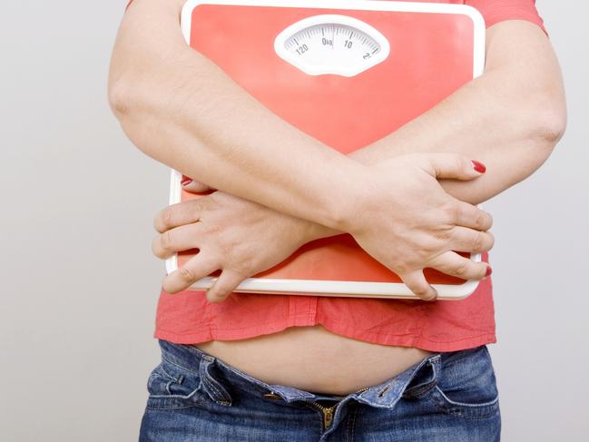 Fat Person With Scales. Thinkstock