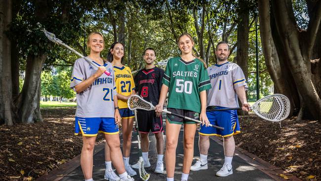 Lacrosse players Nelly Mollison, Ava Dorinko, Cal Gibson, Marley Dawson and Sean Aaron. Picture: Jake Nowakowski