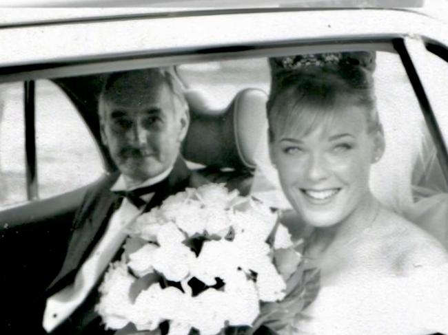 Peter Cahill, with his daughter, Lee-Anne Cahill, on her wedding day in 1999. She is unhappy with how her fathers aged care home dealt with his last few hours of life. Picture: Supplied