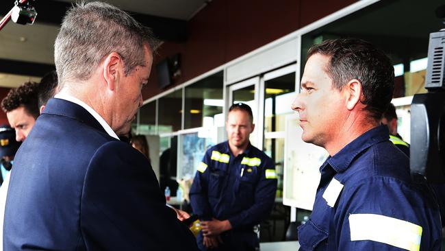 An engineer talks to Bill Shorten on the campaign trail at Gladstone Ports. Picture: Kym Smith