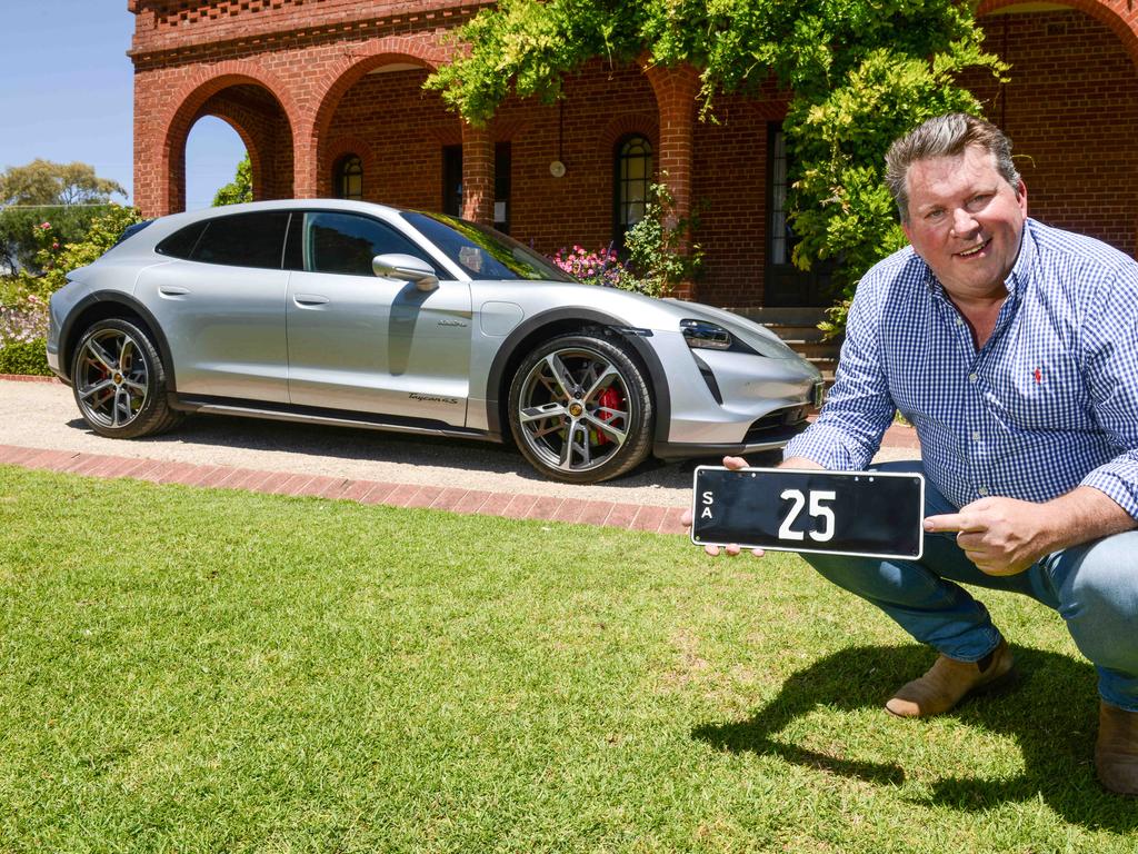 Stewart Kay from Historic Plates with number plate 25 up for auction. Picture: Brenton Edwards