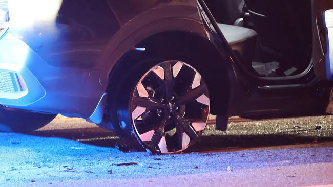 The vehicle’s tyres deflated after the teens ran over stop sticks. Picture: Alex Coppel