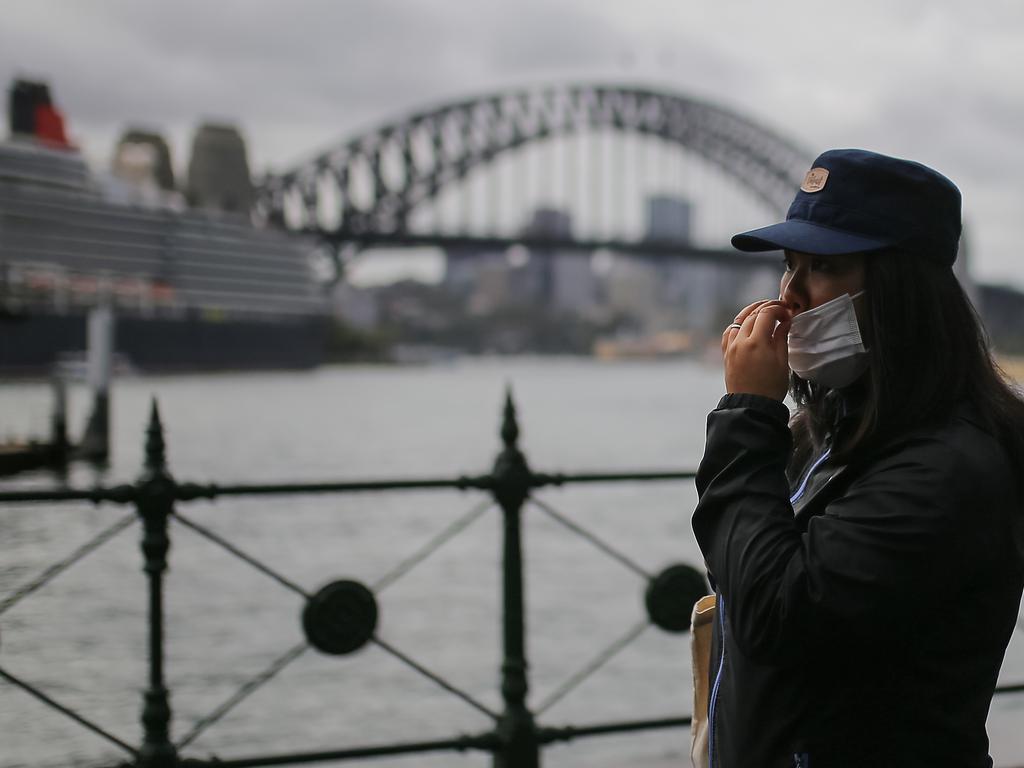 A woman wearing a face mask as a preventative measure against coronavirus in Sydney. Picture: Steven Saphore/AAP