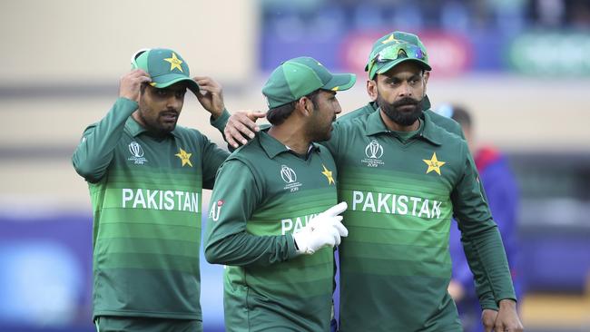 Pakistan's captain Sarfaraz Ahmed, C, and teammates leave the field after their win. Picture: AP