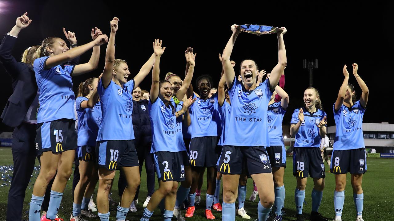 Sydney FC pose with the Premiers Plate after the round 14 W-League match after defeating Melbourne Victory at Cromer Park, on March 31 in Sydney.