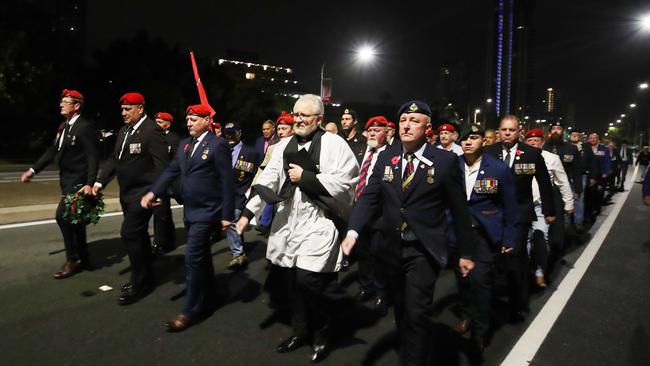 Dawn Service at Southport. an unauthorized march makes its way down the Gold Coast Highway. Picture Glenn Hampson