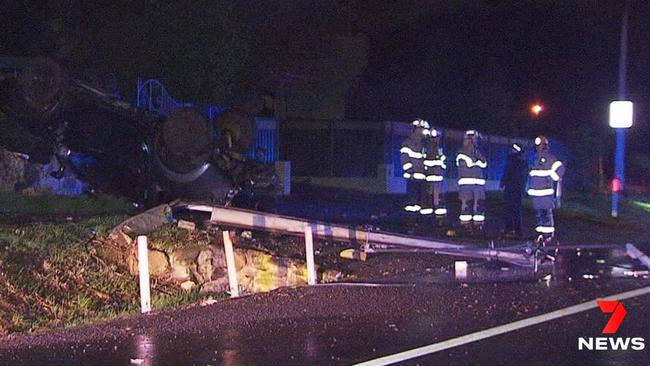 A 20-year-old driver has been taken to hospital after his ute flipped on its roof after crashing into a Stobie pole at Torrens Park. Picture: 7NEWS