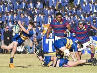 IN CONTROL: Toowoomba Grammar School player Henry Wunsch fires off a pass during his O'Callaghan Cup win over Downlands. Picture: Nev Madsen