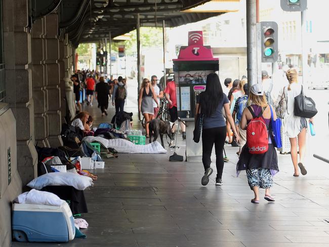 Homeless outside Flinders Street station. . Picture: Nicole Garmston