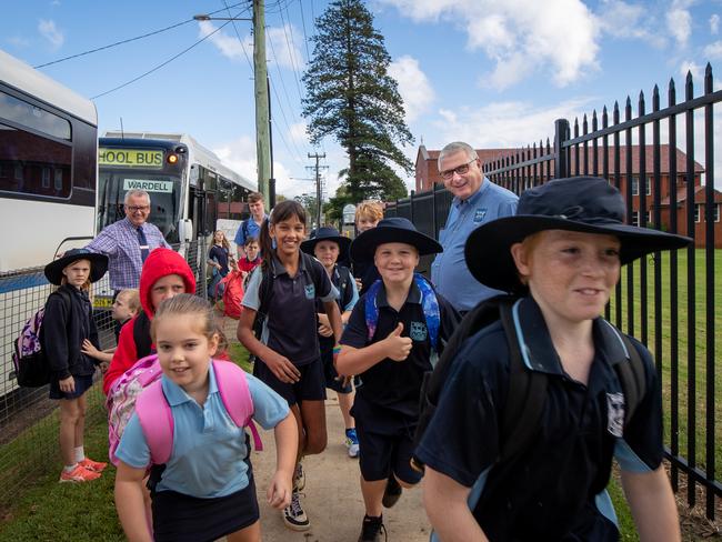 Wardell Primary kids arrive at Alstonville Primary under the watch of Alstonville principal Peter Flannery and Wardell principal David Owen. Picture: Danielle Smith