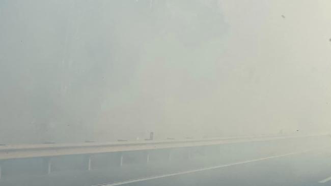 Smoke warning issued for areas around Blackwater near Ipswich as fire can be seen next to the Cunningham Highway. Photo: Ipswich Metal Recycling