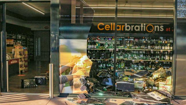 The aftermath of a ram raid on Cellarbrations in Zuccoli. Picture Glenn Campbell