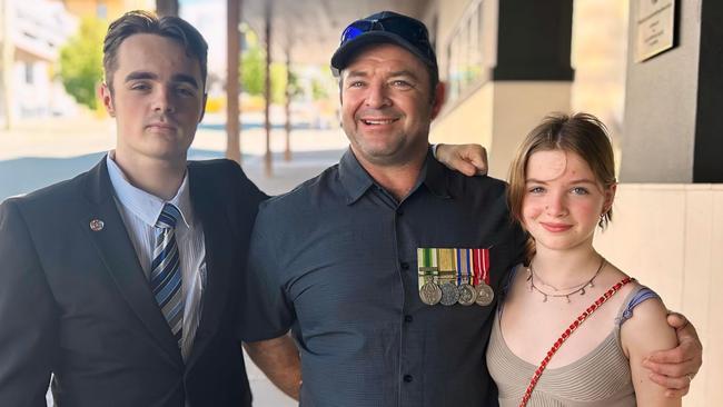 Sam Conley, Brad Gillam and Nataly Gillam outside the RSL (left to right) at the Gympie 2024 Anzac Day parade.