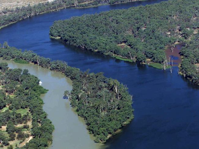 Aerial picture of the convergence of the muddy Darling River (L) and the Murray River (R) at Wentworth, NSW. In the forground is the lock and the weir.