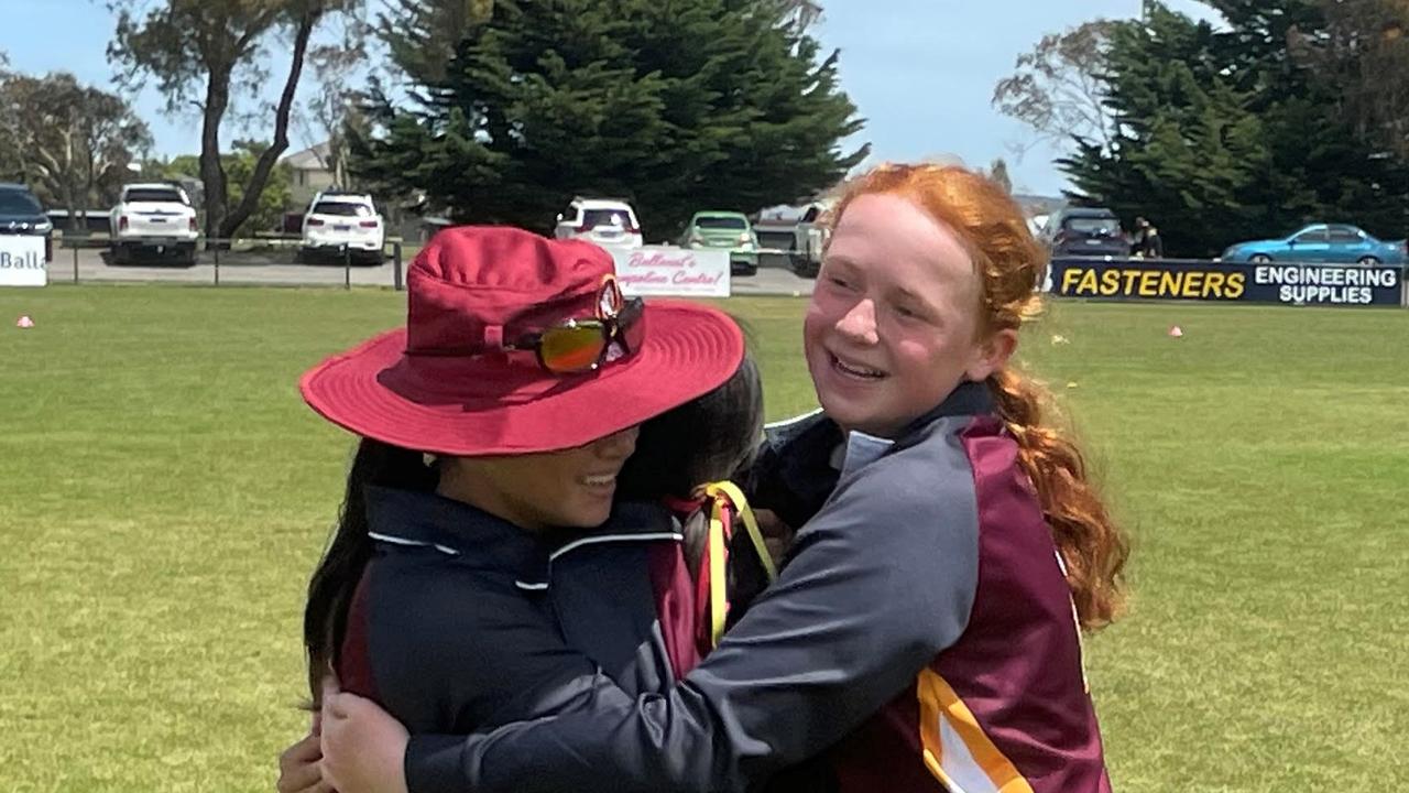 Queensland teammates embrace after winning the School Sports Australia cricket titles in 12 and under girls. Picture: Shane Jones.