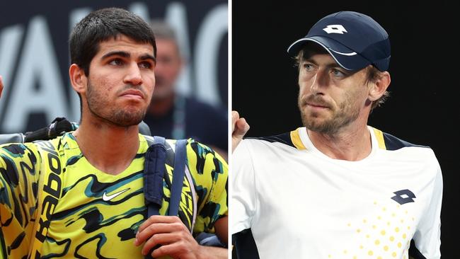 Carlos Alcaraz and John Millman. Photo: Getty.